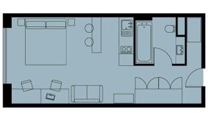 Modern studio apartment floor plan showcasing an open layout with a cozy bedroom area, stylish living space, efficient kitchen, and elegant bathroom.