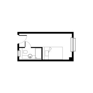 Compact studio floor plan with a cozy bedroom and integrated bathroom featuring modern amenities.