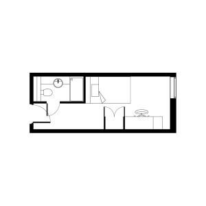 Contemporary floor plan showcasing a compact studio apartment with a cozy bedroom, modern bathroom, and efficient kitchen layout.
