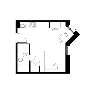 Modern open floor plan featuring a cozy bedroom, sleek kitchen, dining area, and a stylish bathroom.