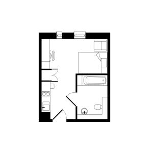 Efficient studio apartment floor plan featuring a compact kitchen, cozy living area, and a modern bathroom.