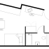 Modern studio apartment floor plan featuring a spacious main room with a bed and dining area, along with a compact bathroom layout.