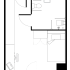 Cozy studio apartment floor plan with a modern bathroom, compact kitchenette, and efficient workspace.