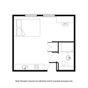 Chic studio floor plan featuring a cozy bedroom, compact kitchen, and modern bathroom.